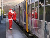 Santa waving the train off at Littleborough station in 2009